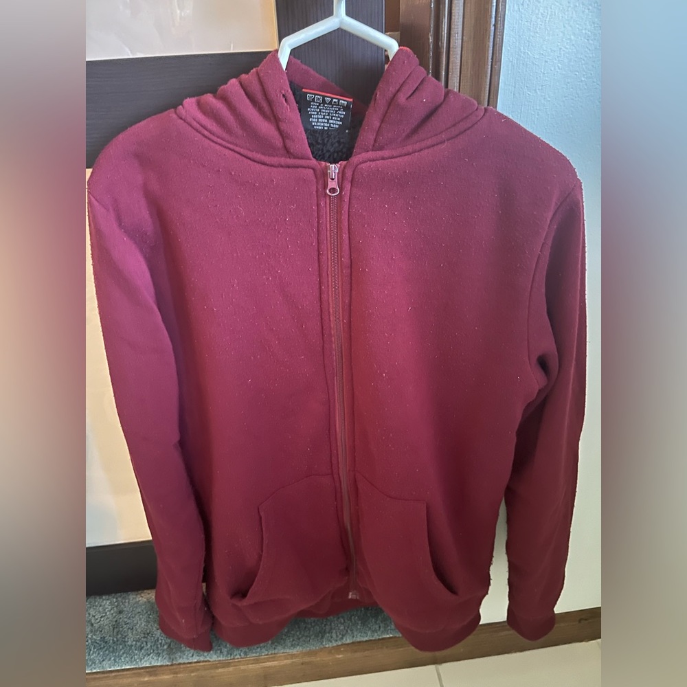 Men’s medium dark red zip up jacket. Fuzzy on the inside